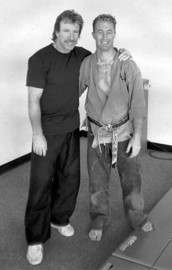 Artemis BJJ Brazilian Jiu Jitsu Bristol interview with John Will, shown with Chuck Norris, 1990s